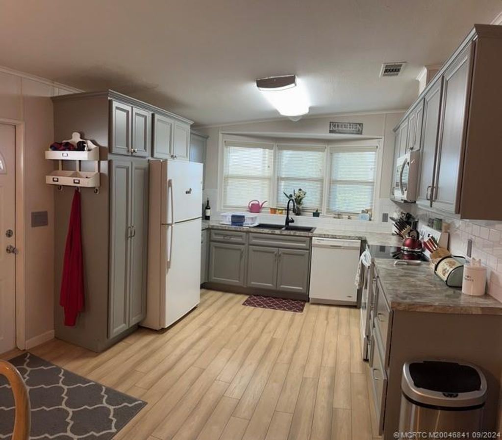 Photo of 16093 SW Indianwood Circle SW, Indiantown, FL 34956 (MLS # M20046841)