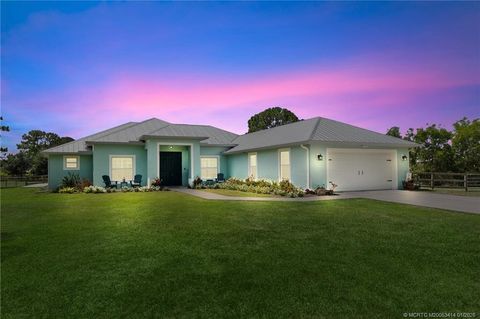 Photo of 9758 SW Malibu Terrace, Palm City, FL 34990 (MLS # M20053414)