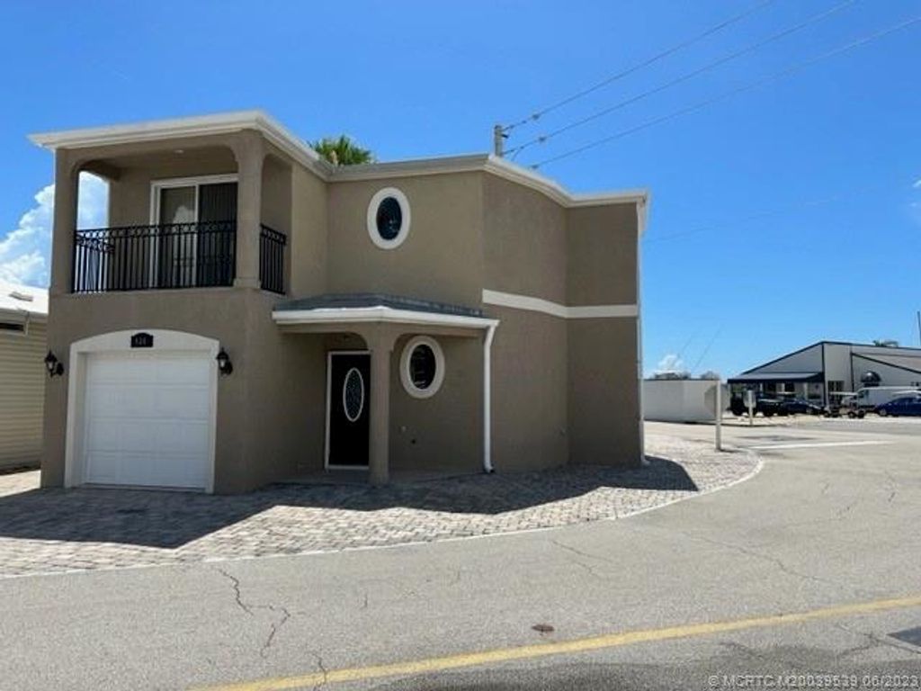 Photo of 424 Nettles Boulevard, Jensen Beach, FL 34957 (MLS # M20039539)