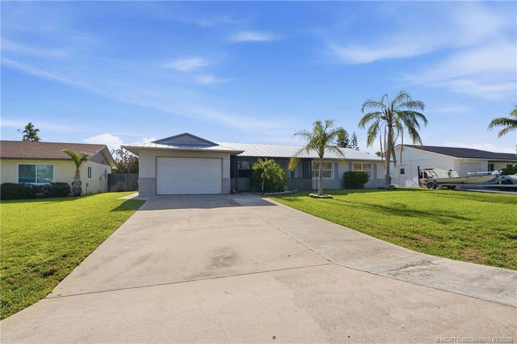 Photo of 2509 NE 18th Lane, Jensen Beach, FL 34957 (MLS # M20056066)