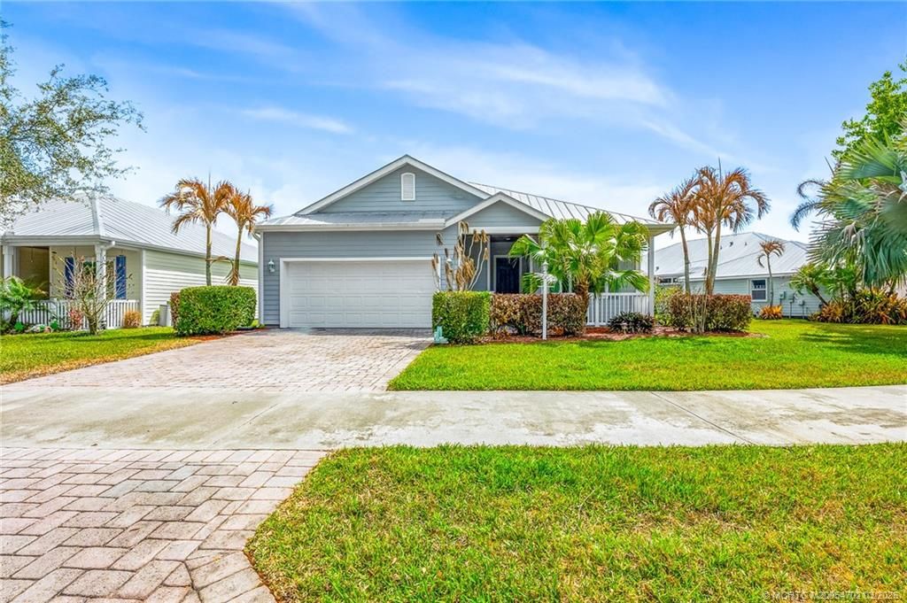 Photo of 615 NE Canoe Park Circle, Port Saint Lucie, FL 34983 (MLS # M20054702)
