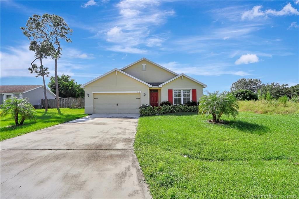 Photo of 1142 SW Ingrassina Avenue, Port Saint Lucie, FL 34953 (MLS # M20041113)