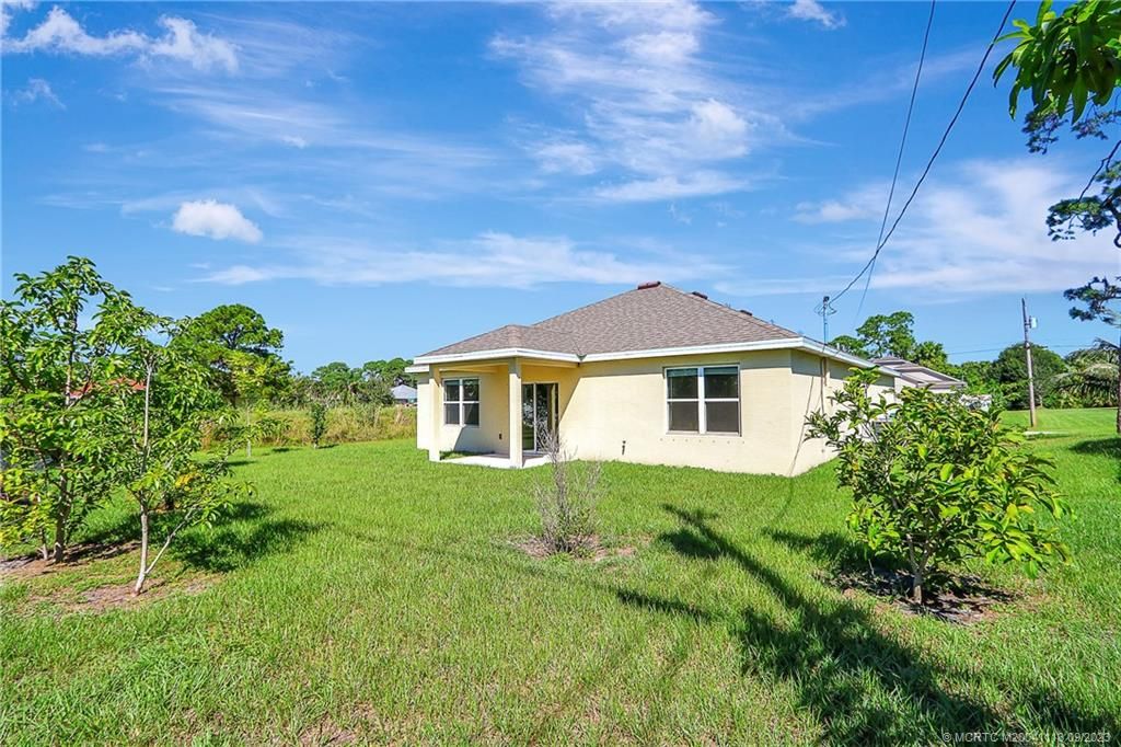 Photo of 1142 SW Ingrassina Avenue, Port Saint Lucie, FL 34953 (MLS # M20041113)
