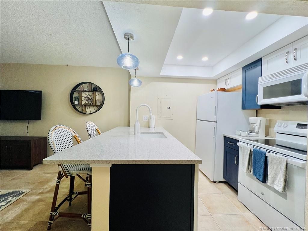 Photo of 9800 S Ocean Drive #211, Jensen Beach, FL 34957 (MLS # M20047828)