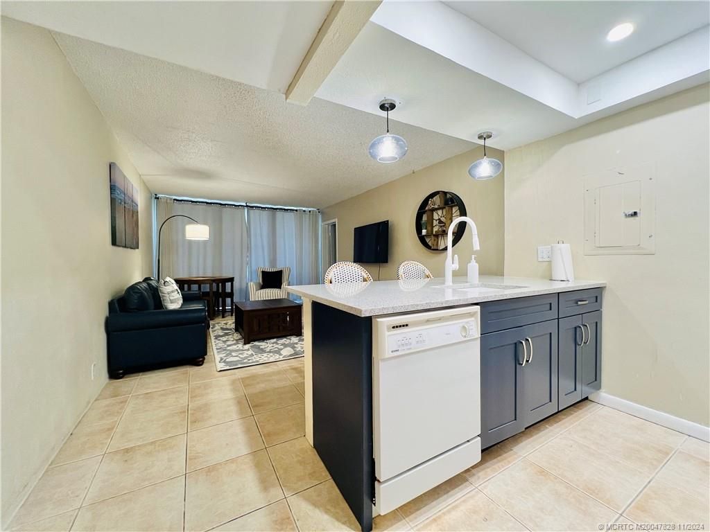 Photo of 9800 S Ocean Drive #211, Jensen Beach, FL 34957 (MLS # M20047828)