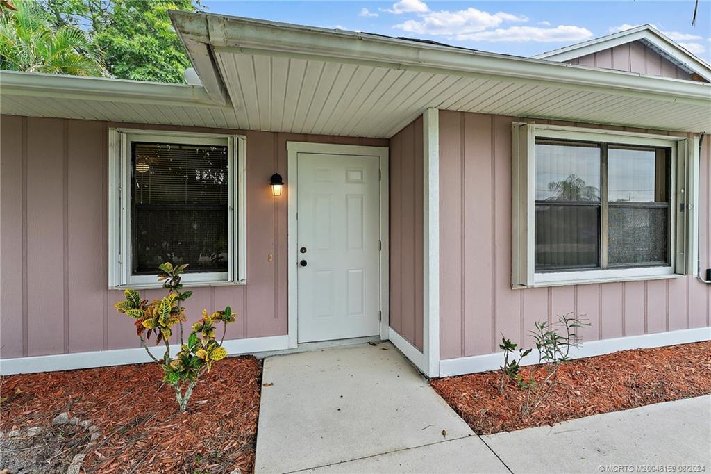 Photo of 1862 SW Hampshire Lane, Port Saint Lucie, FL 34953 (MLS # M20046159)