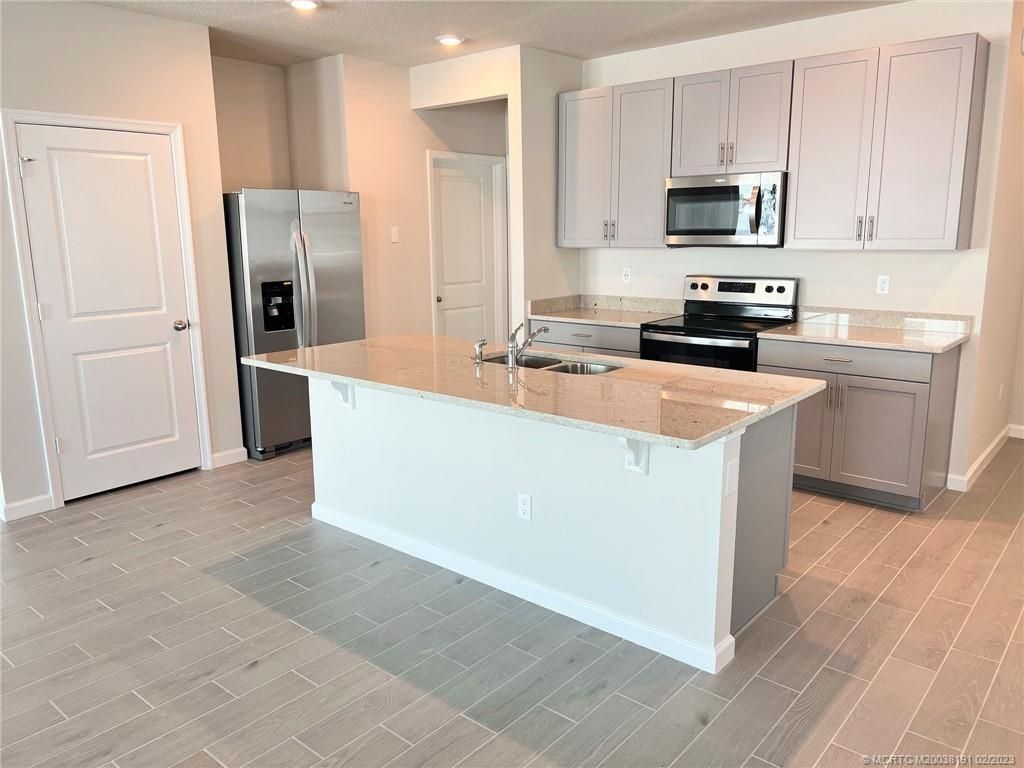 Photo of 253 Osprey Preserve Boulevard, Jensen Beach, FL 34957 (MLS # M20038191)