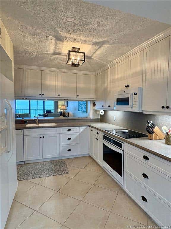 Photo of 2571 Ocean Boulevard NE #405, Stuart, FL 34996 (MLS # M20056313)