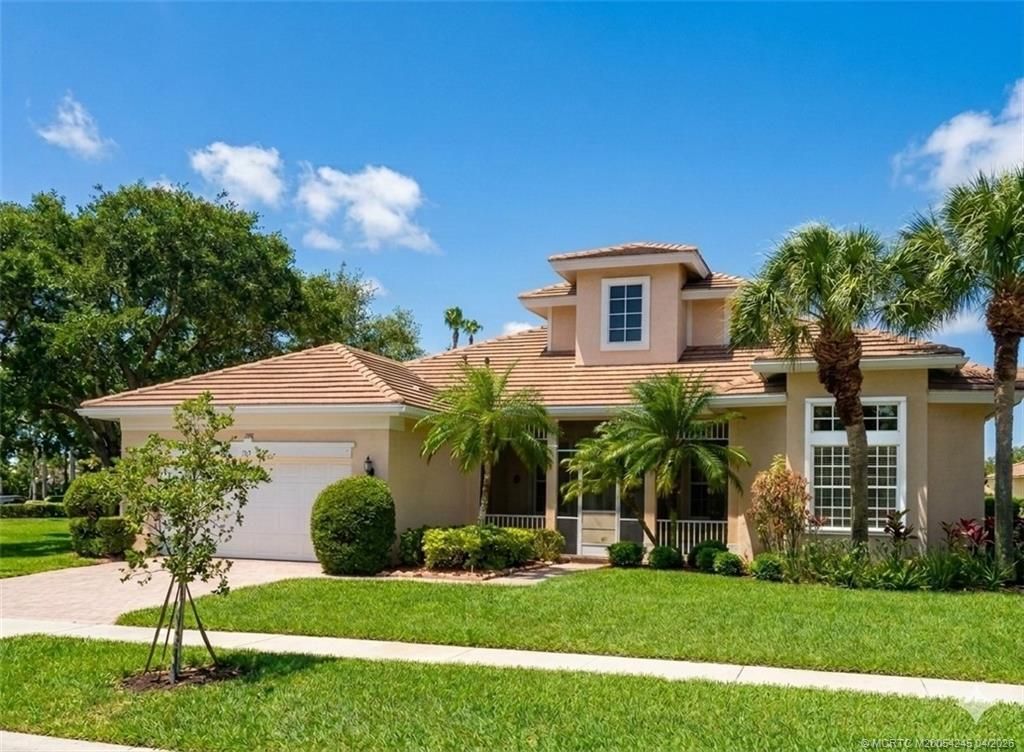 Photo of 127 NW Magnolia Lakes Boulevard, Port Saint Lucie, FL 34986 (MLS # M20054245)