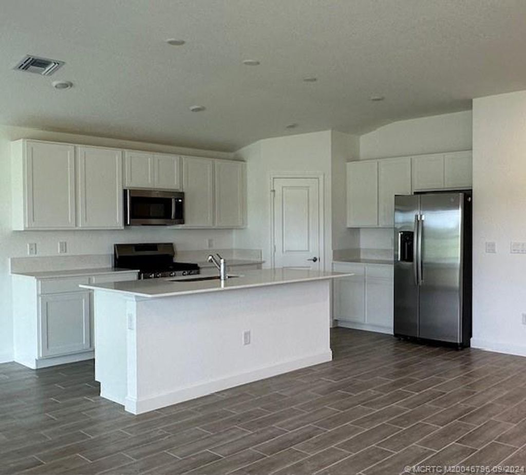 Photo of 6314 NW Windwood Way, Port Saint Lucie, FL 34987 (MLS # M20046796)