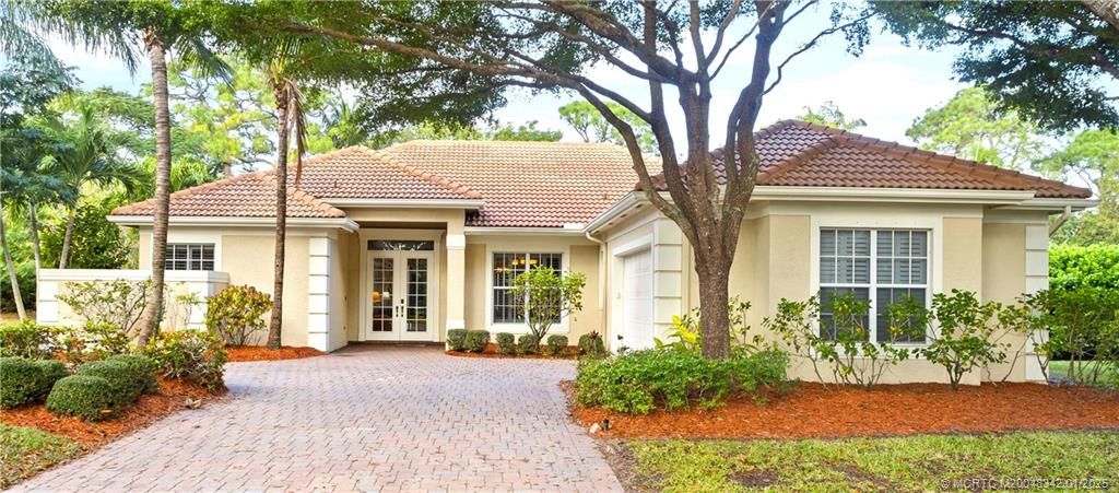 Photo of 876 SW Whisper Ridge Trail, Palm City, FL 34990 (MLS # M20048342)