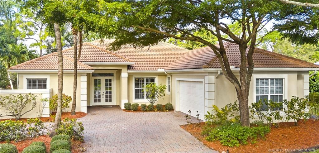 Photo of 876 SW Whisper Ridge Trail, Palm City, FL 34990 (MLS # M20048342)