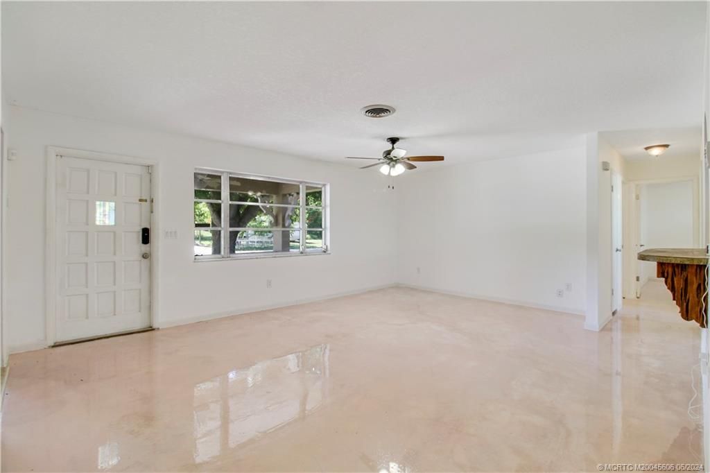 Photo of 1580 NE Media Avenue, Jensen Beach, FL 34957 (MLS # M20045606)