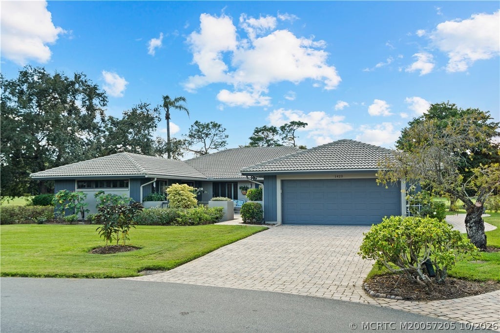 Photo of 1423 SW Troon Circle, Palm City, FL 34990 (MLS # M20057205)