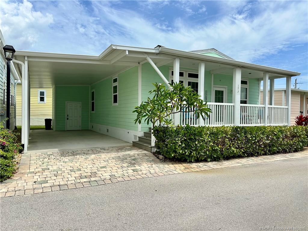 Photo of 173 NE Portside Drive, Jensen Beach, FL 34957 (MLS # M20056497)