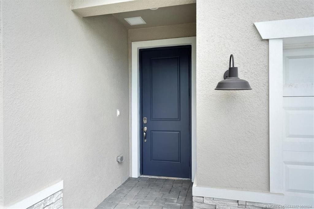 Photo of 6512 NW CLOVERDALE Avenue, Port Saint Lucie, FL 34987 (MLS # M20044882)