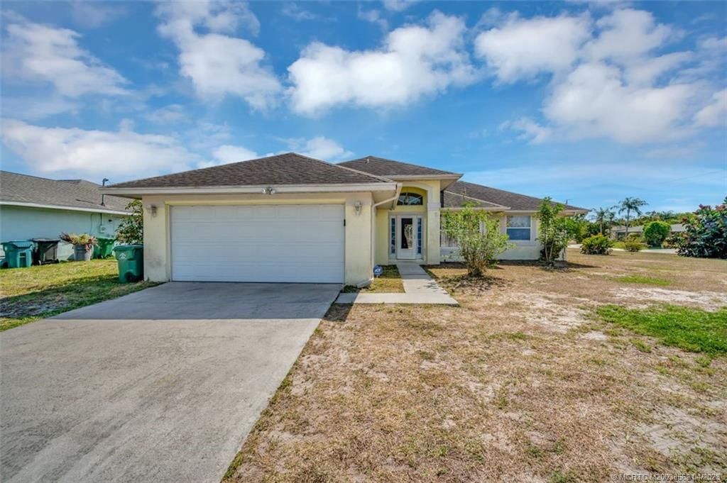 Photo of 1591 SE Airoso Boulevard, Port Saint Lucie, FL 34983 (MLS # M20038562)