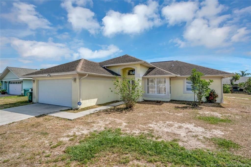 Photo of 1591 SE Airoso Boulevard, Port Saint Lucie, FL 34983 (MLS # M20038562)