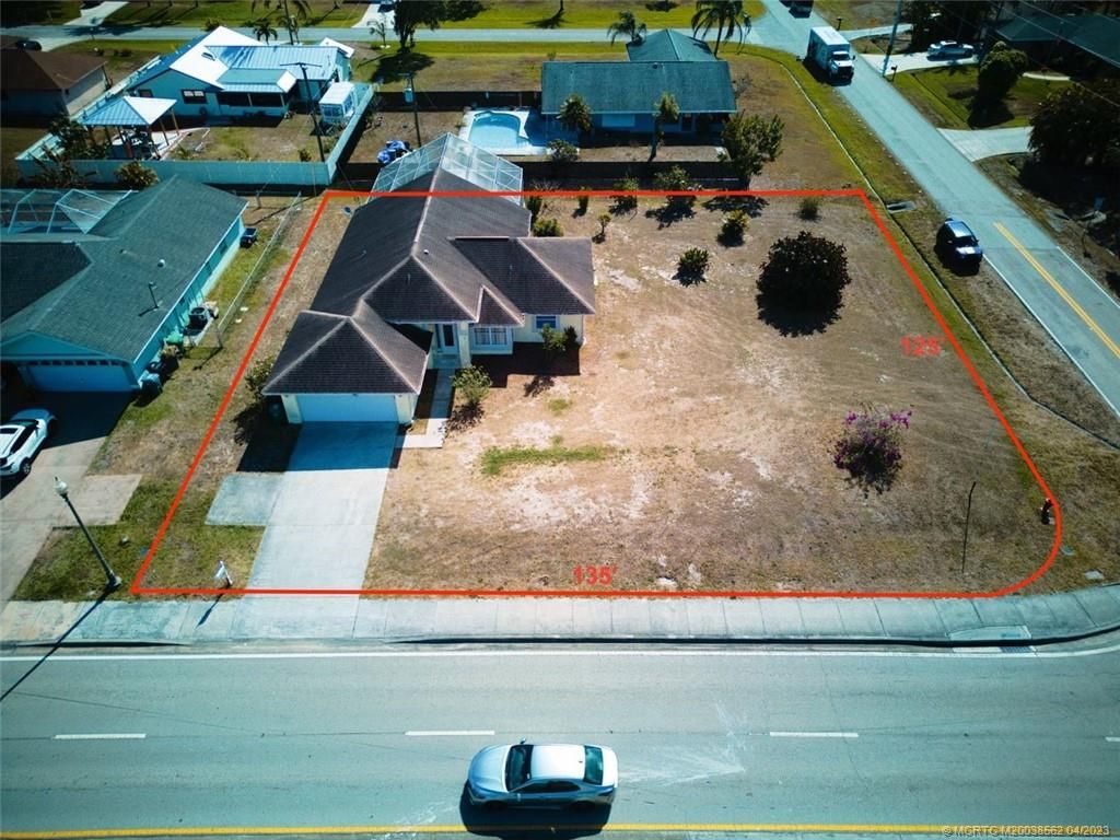 Photo of 1591 SE Airoso Boulevard, Port Saint Lucie, FL 34983 (MLS # M20038562)