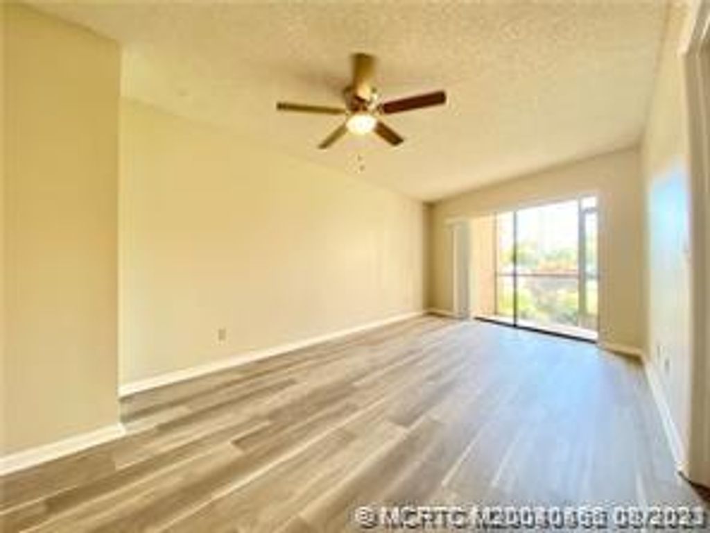 Photo of 2041 NE Collins Circle #5-1, Jensen Beach, FL 34957 (MLS # M20040466)