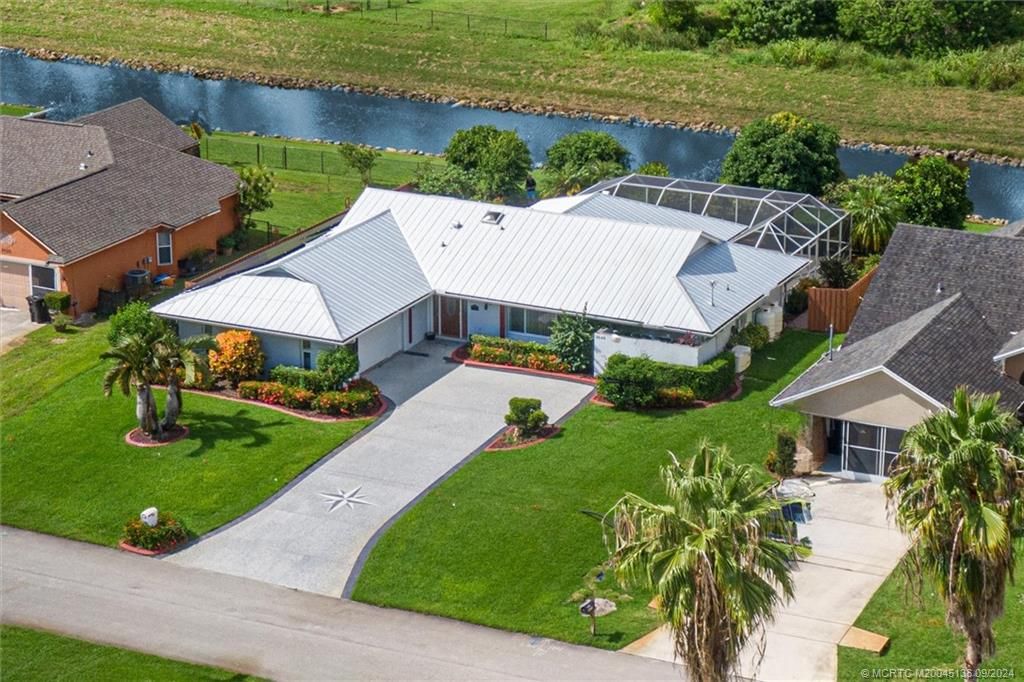 Photo of 2646 SW Monterrey Lane, Port Saint Lucie, FL 34953 (MLS # M20045136)