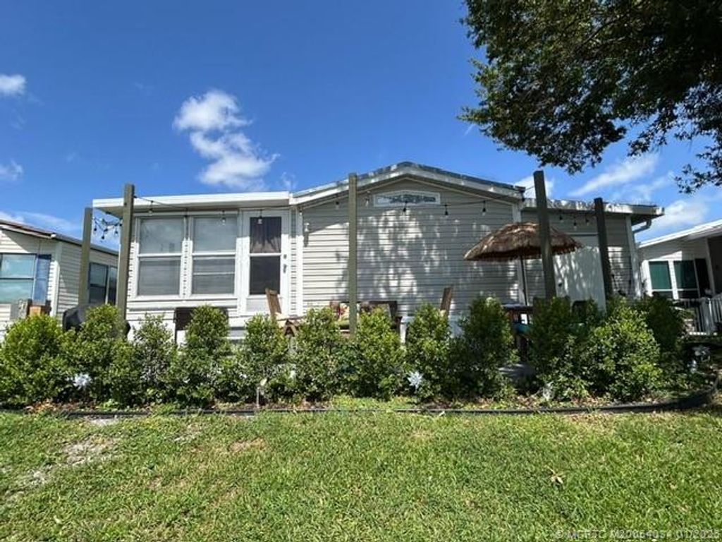 Photo of 153 Plantation Boulevard, Lake Worth, FL 33467 (MLS # M20054034)