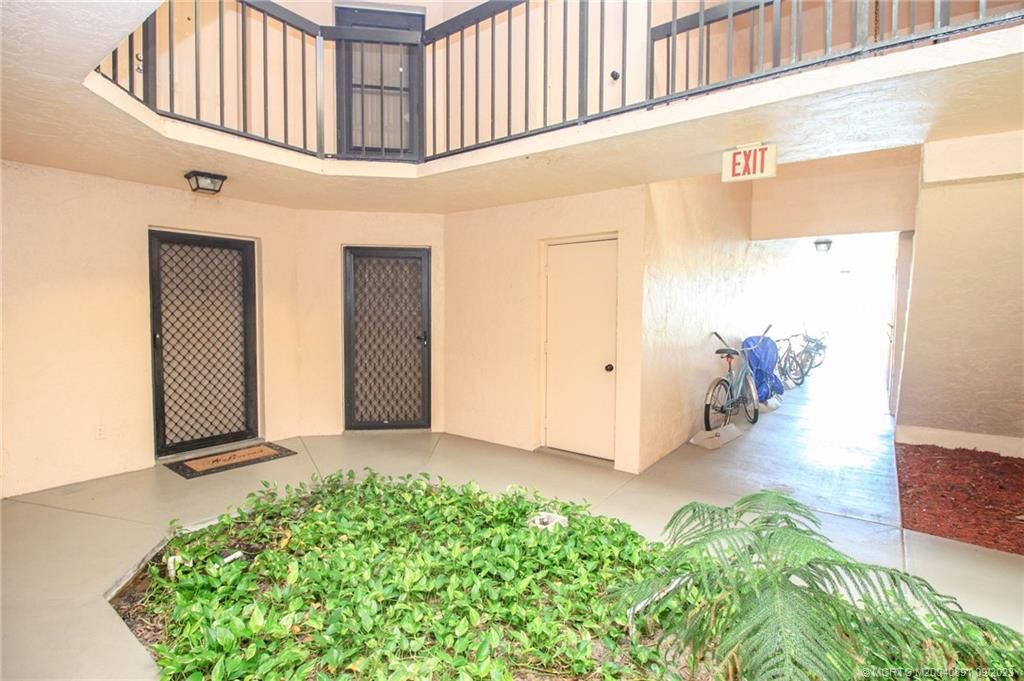 Photo of 2055 NE Collins Circle #6-30, Jensen Beach, FL 34957 (MLS # M20040891)