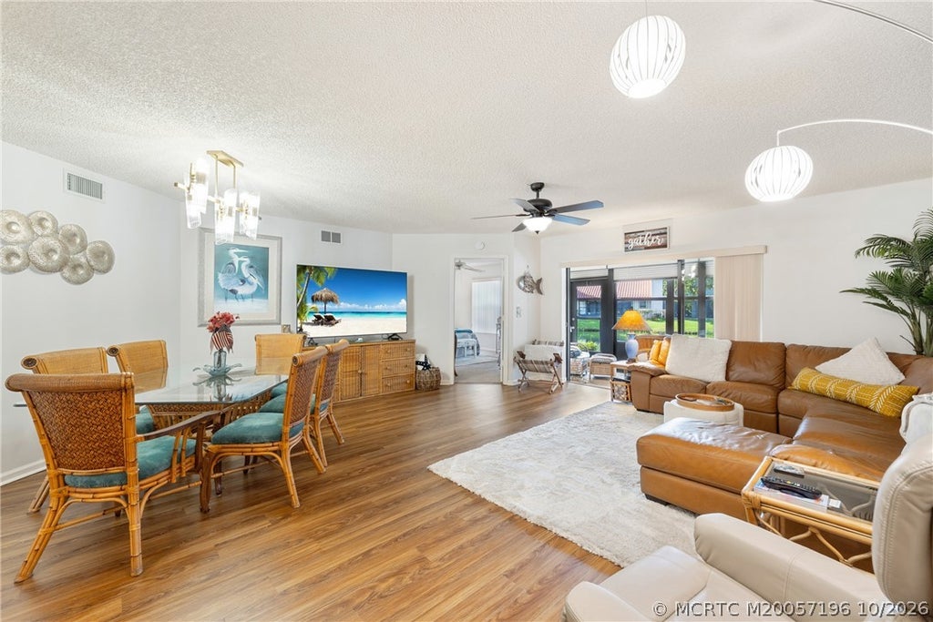 Photo of 3450 SE Martinique Trace #103, Stuart, FL 34997 (MLS # M20057196)