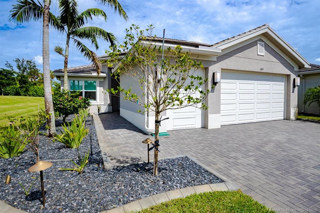 Photo of 11859 SW Paradise River Road SW, Port Saint Lucie, FL 34987 (MLS # M20051933)