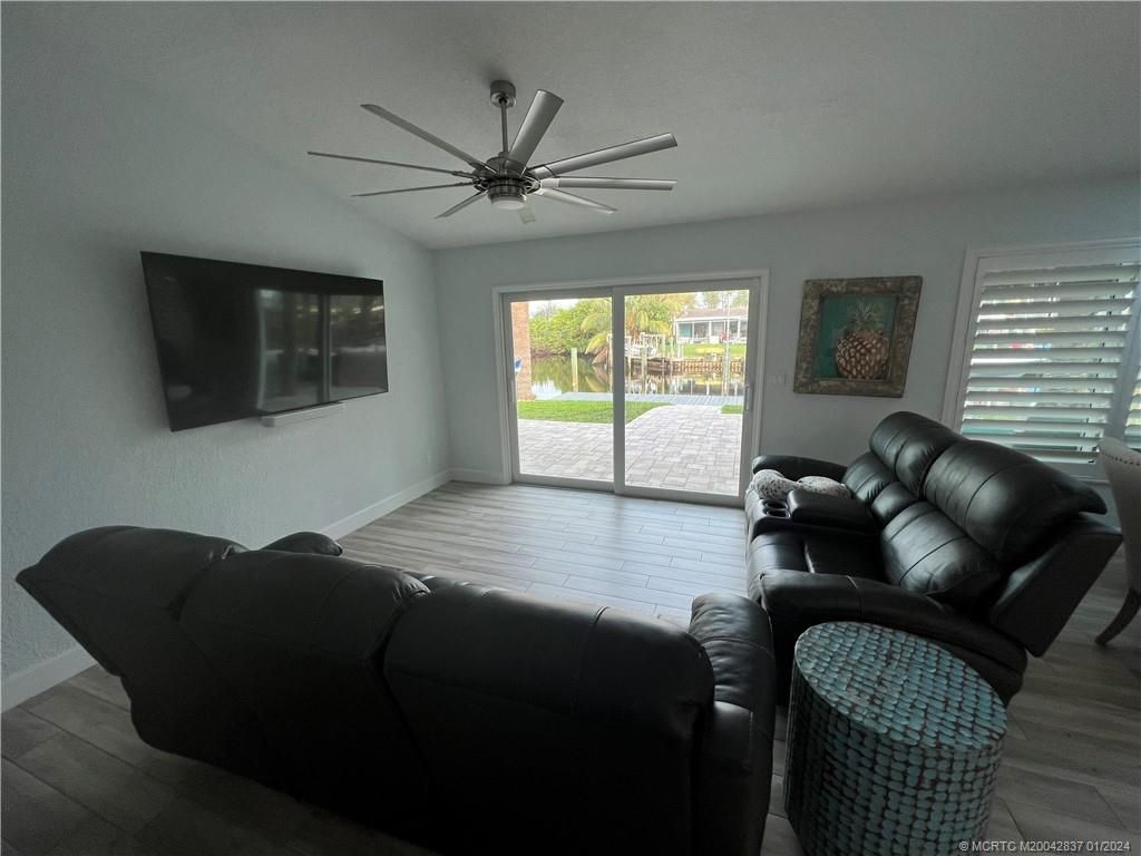 Photo of 1455 SW Egret Way, Palm City, FL 34990 (MLS # M20042837)