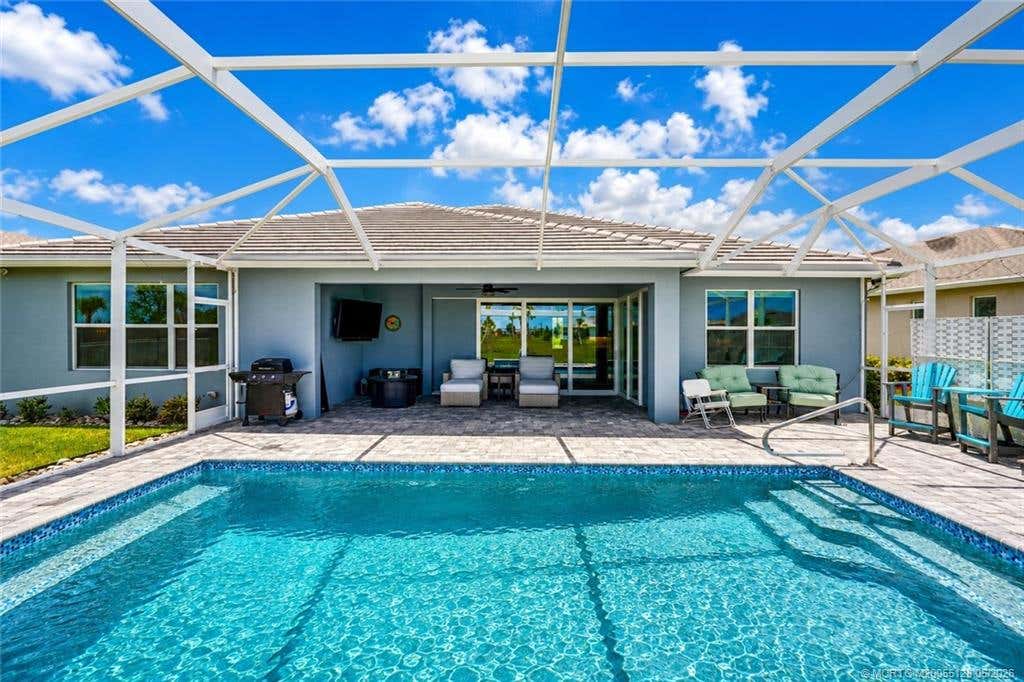 Photo of 10255 SW Sarcoline Drive, Port Saint Lucie, FL 34987 (MLS # M20055128)