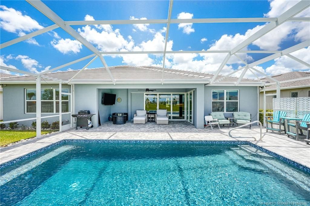 Photo of 10255 SW Sarcoline Drive, Port Saint Lucie, FL 34987 (MLS # M20055128)