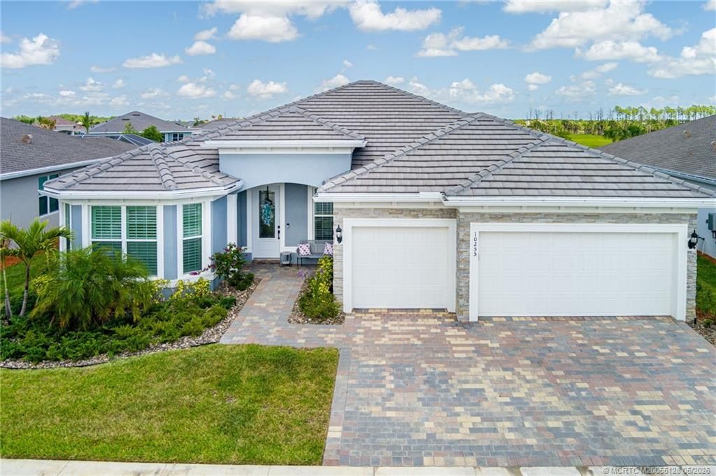 Photo of 10255 SW Sarcoline Drive, Port Saint Lucie, FL 34987 (MLS # M20055128)