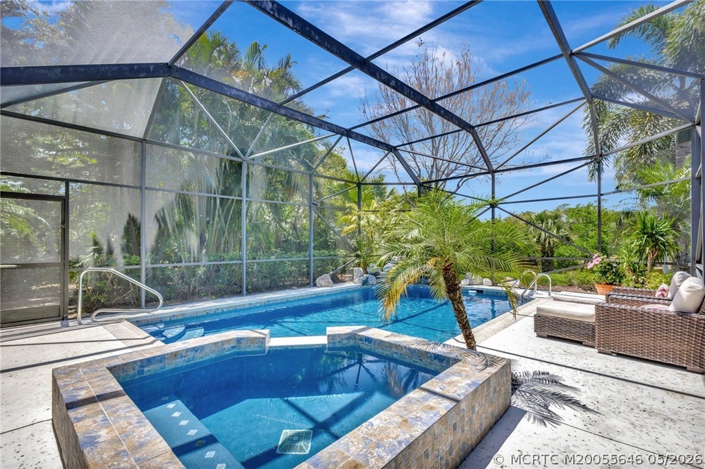 Photo of 12306 Harbour Ridge Boulevard, Palm City, FL 34990 (MLS # M20055646)