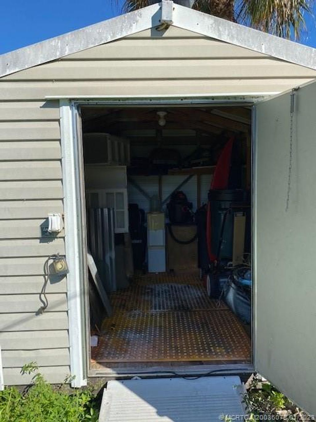 Photo of 4770 SE Ebbtide Avenue, Stuart, FL 34997 (MLS # M20036073)