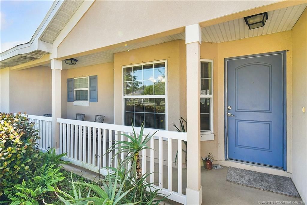 Photo of 142 SW Crescent Avenue, Port Saint Lucie, FL 34984 (MLS # M20049991)