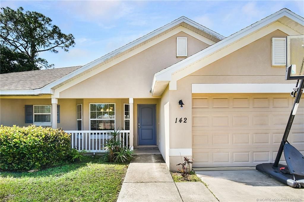 Photo of 142 SW Crescent Avenue, Port Saint Lucie, FL 34984 (MLS # M20049991)