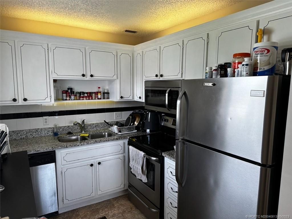 Photo of 1225 NW 21st Street #4-2410, Stuart, FL 34994 (MLS # M20040813)