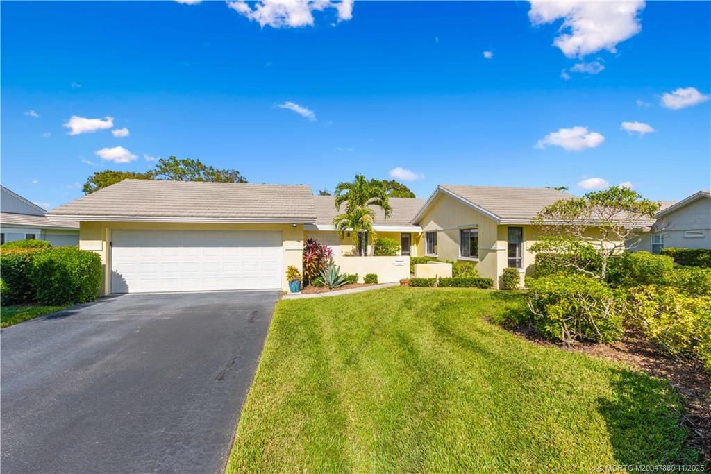 Photo of 2106 NW Greenbriar Lane, Palm City, FL 34990 (MLS # M20047880)