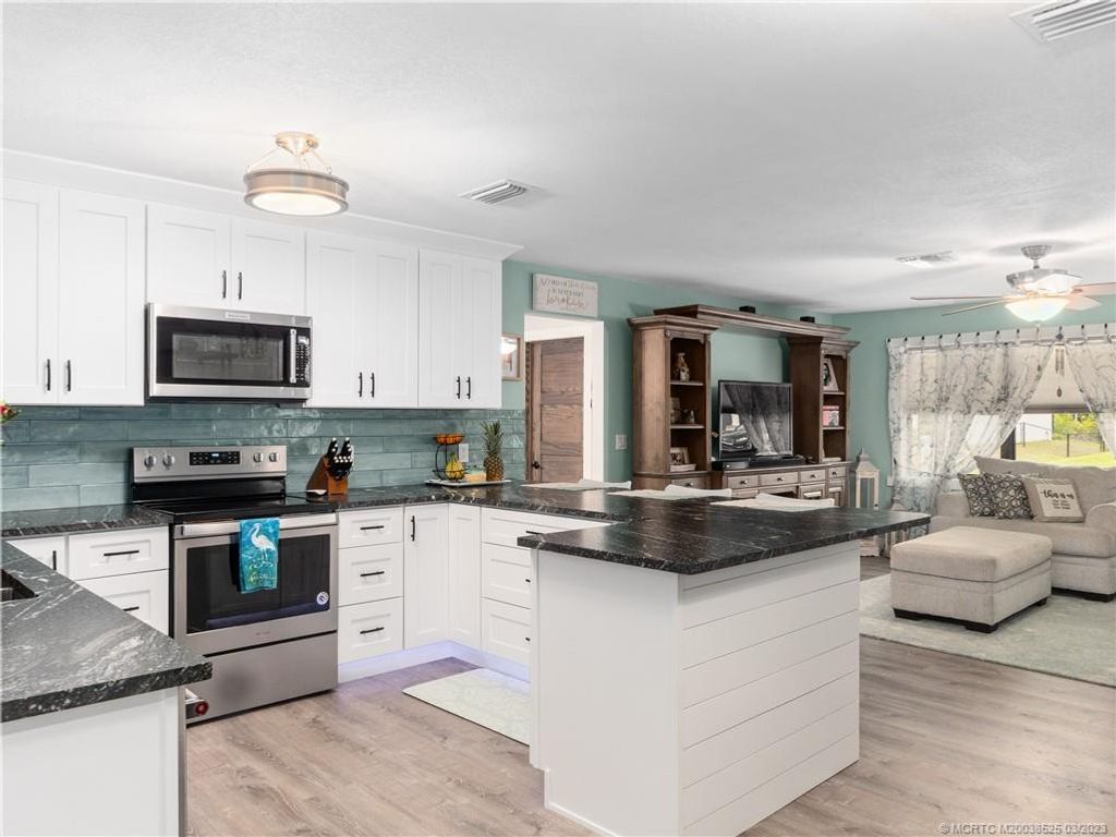 Photo of 4426 SW Wabash Street, Port Saint Lucie, FL 34953 (MLS # M20038525)