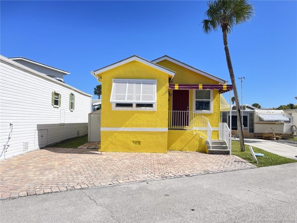 Photo of 630 Nettles Boulevard, Jensen Beach, FL 34957 (MLS # M20054088)