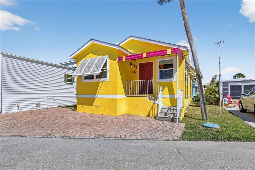 Photo of 630 Nettles Boulevard, Jensen Beach, FL 34957 (MLS # M20054088)