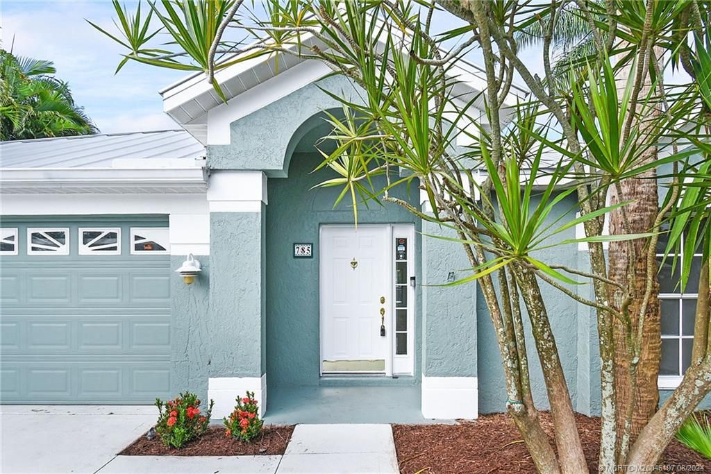 Photo of 785 NW Waterlily Place, Jensen Beach, FL 34957 (MLS # M20046197)