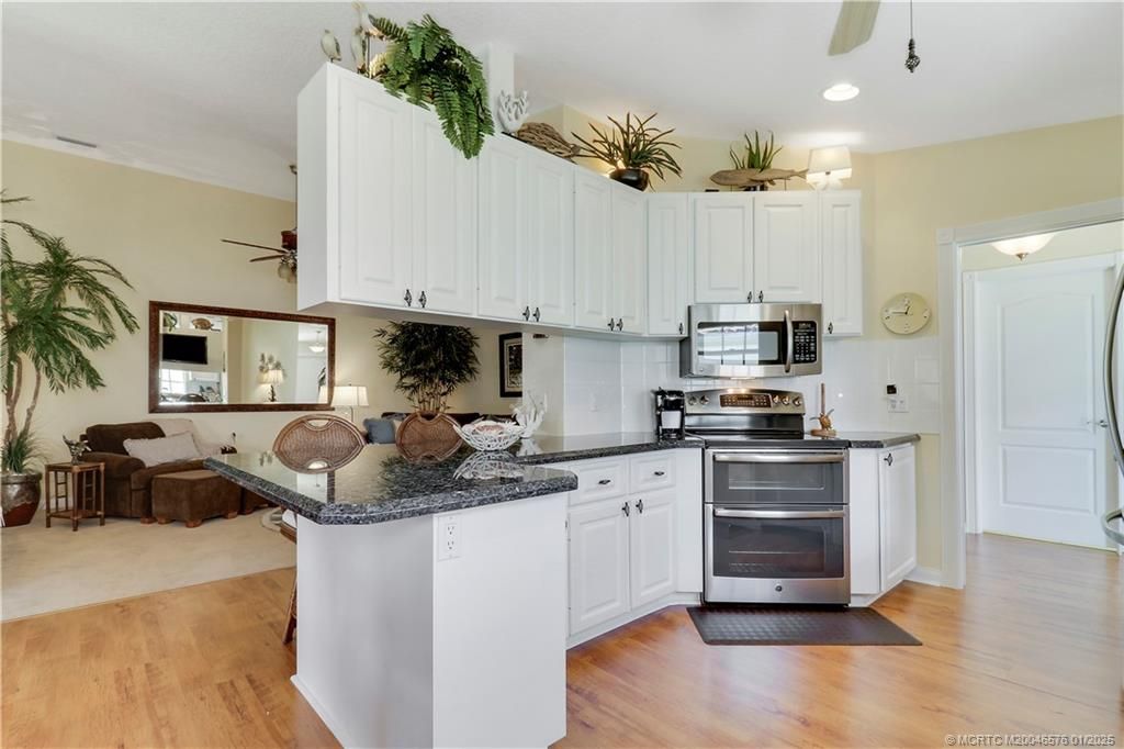 Photo of 1619 SW Shady Lake Terrace, Palm City, FL 34990 (MLS # M20046576)