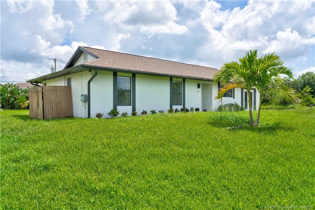 Photo of 1191 SW Lawndale Avenue, Port Saint Lucie, FL 34953 (MLS # M20040521)