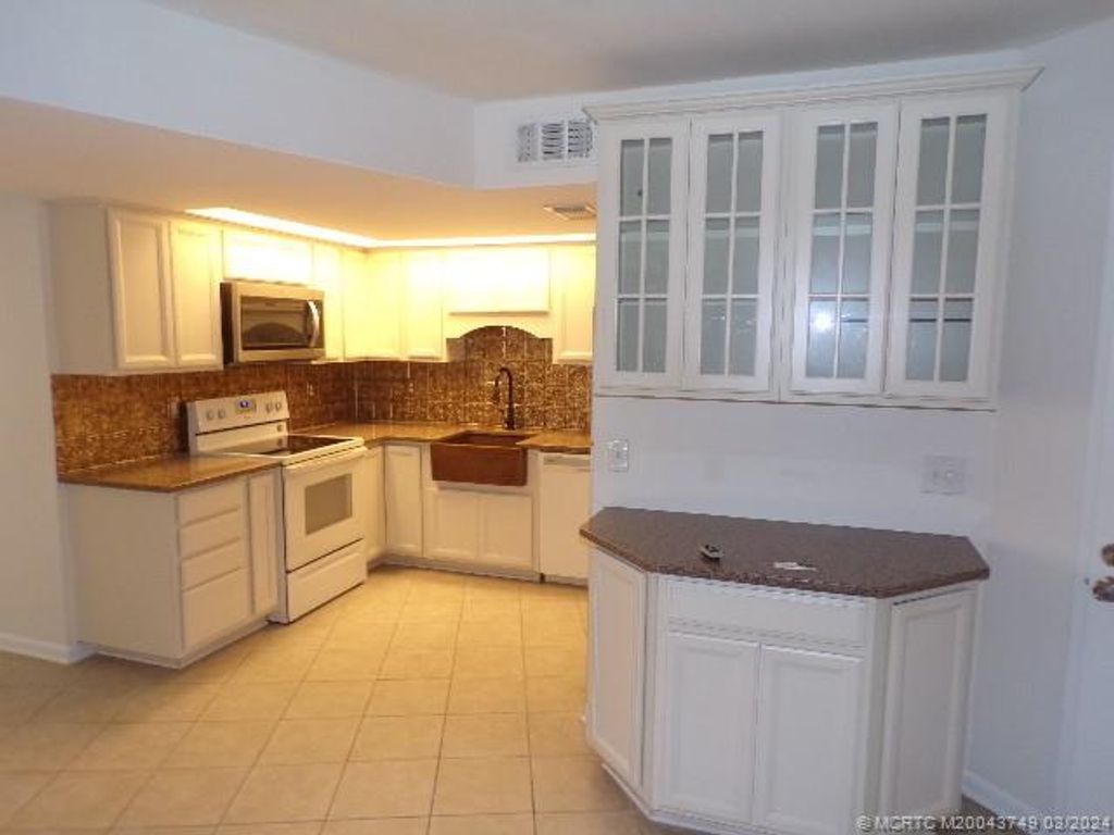 Photo of 2013 NE Collins Circle #50, Jensen Beach, FL 34957 (MLS # M20043749)
