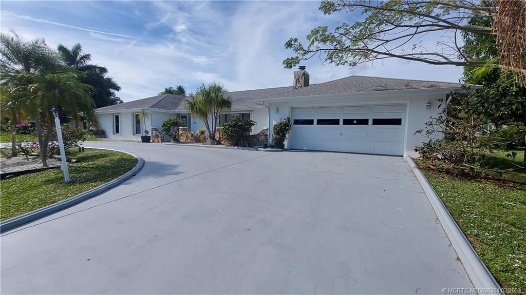 Photo of 2826 SE Calvin Street, Port Saint Lucie, FL 34952 (MLS # M20038354)