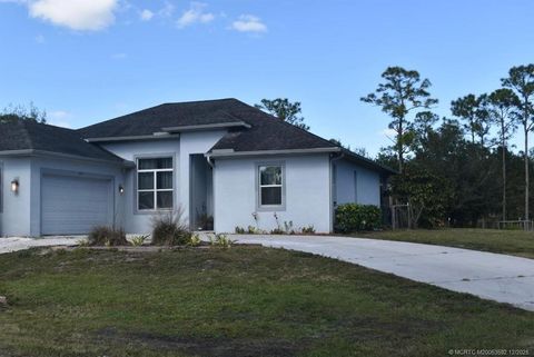 Photo of 6347 SW Travers Street, Palm City, FL 34990 (MLS # M20053592)