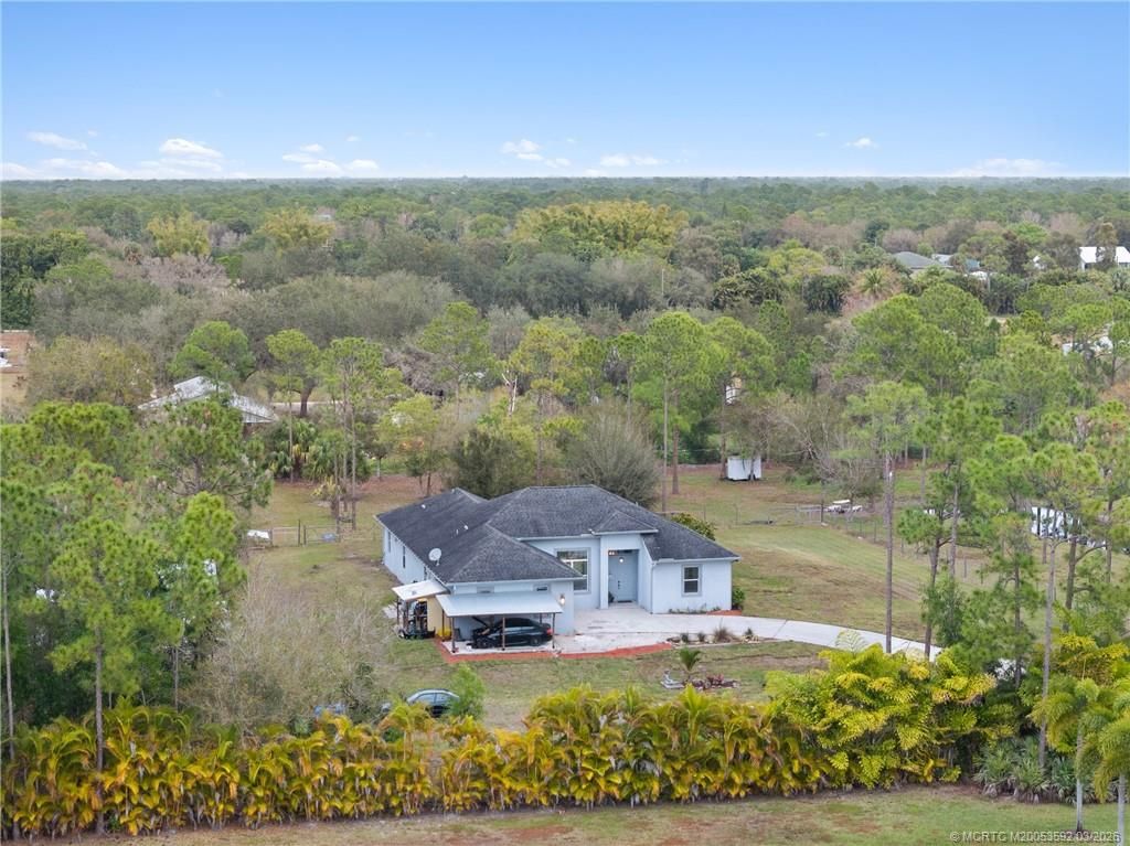 Photo of 6347 SW Travers Street, Palm City, FL 34990 (MLS # M20053592)