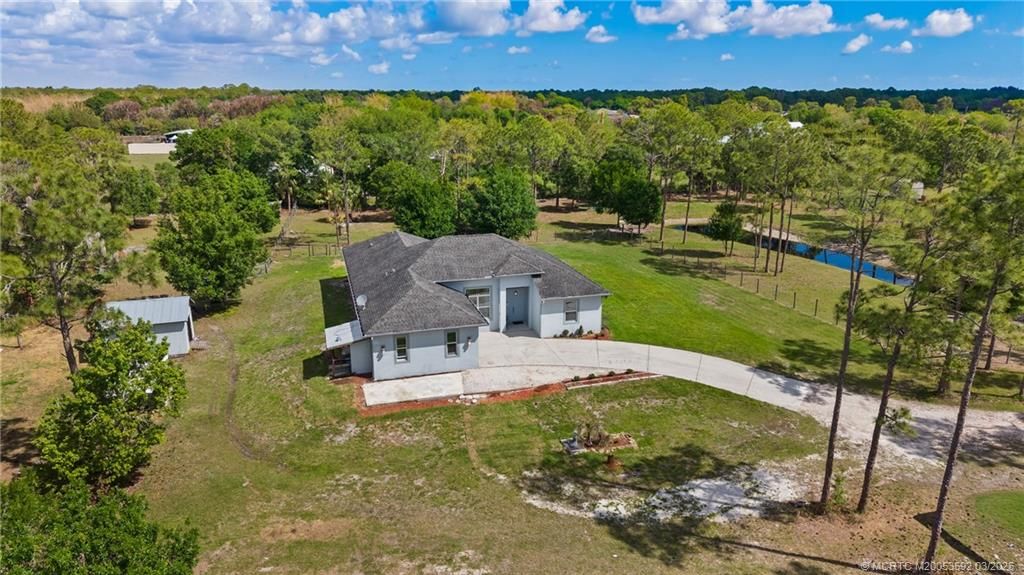 Photo of 6347 SW Travers Street, Palm City, FL 34990 (MLS # M20053592)